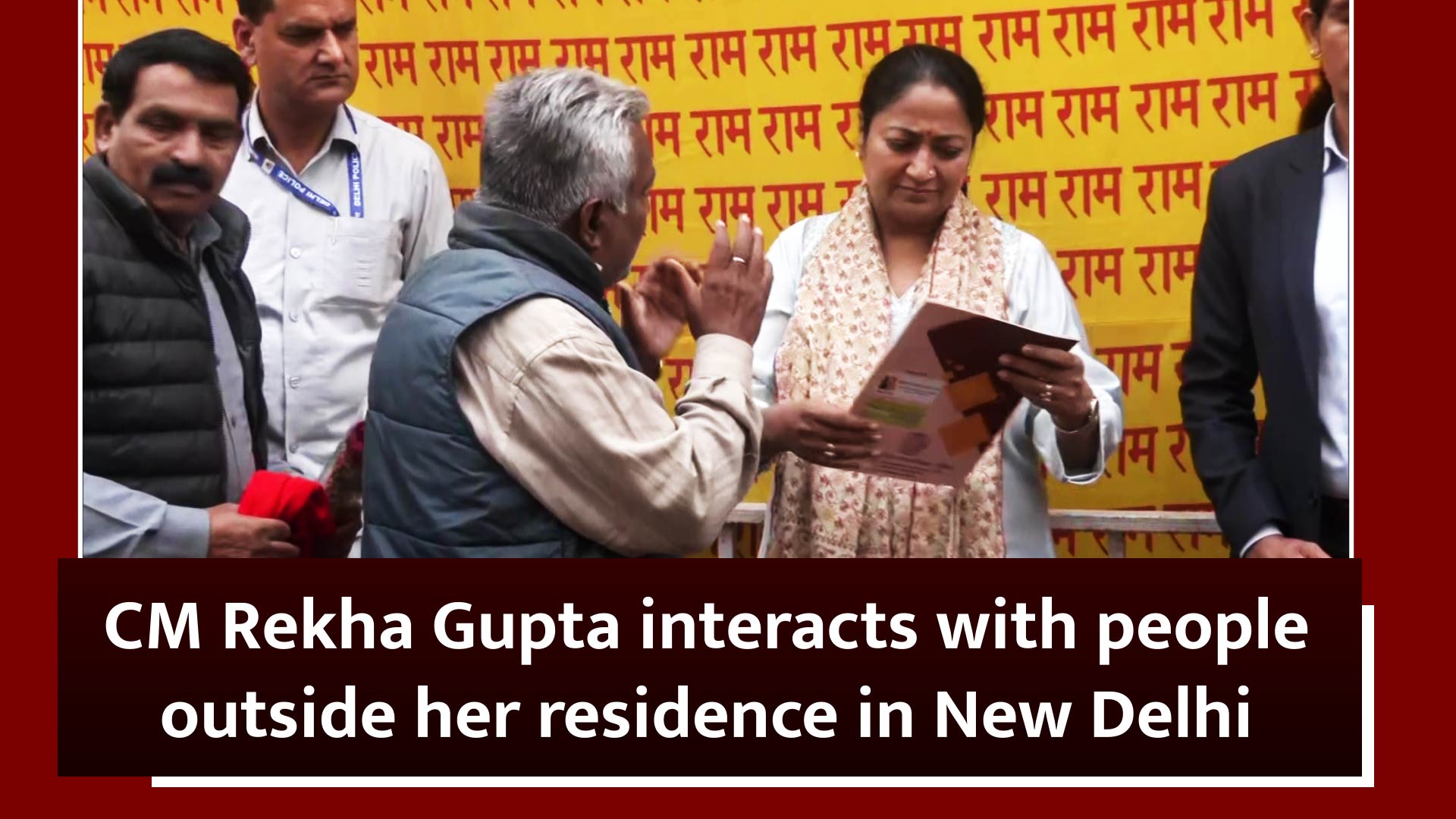 CM Rekha Gupta interacts with people outside her residence in New Delhi